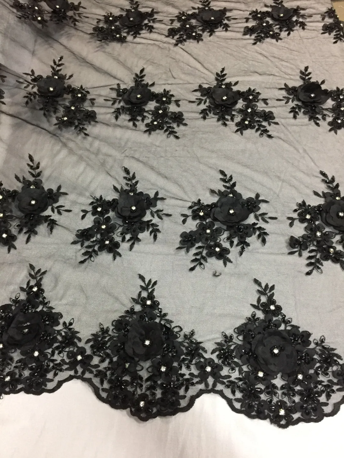 Lavish black 3D flowers embeoider and beaded on a mesh lace -yd