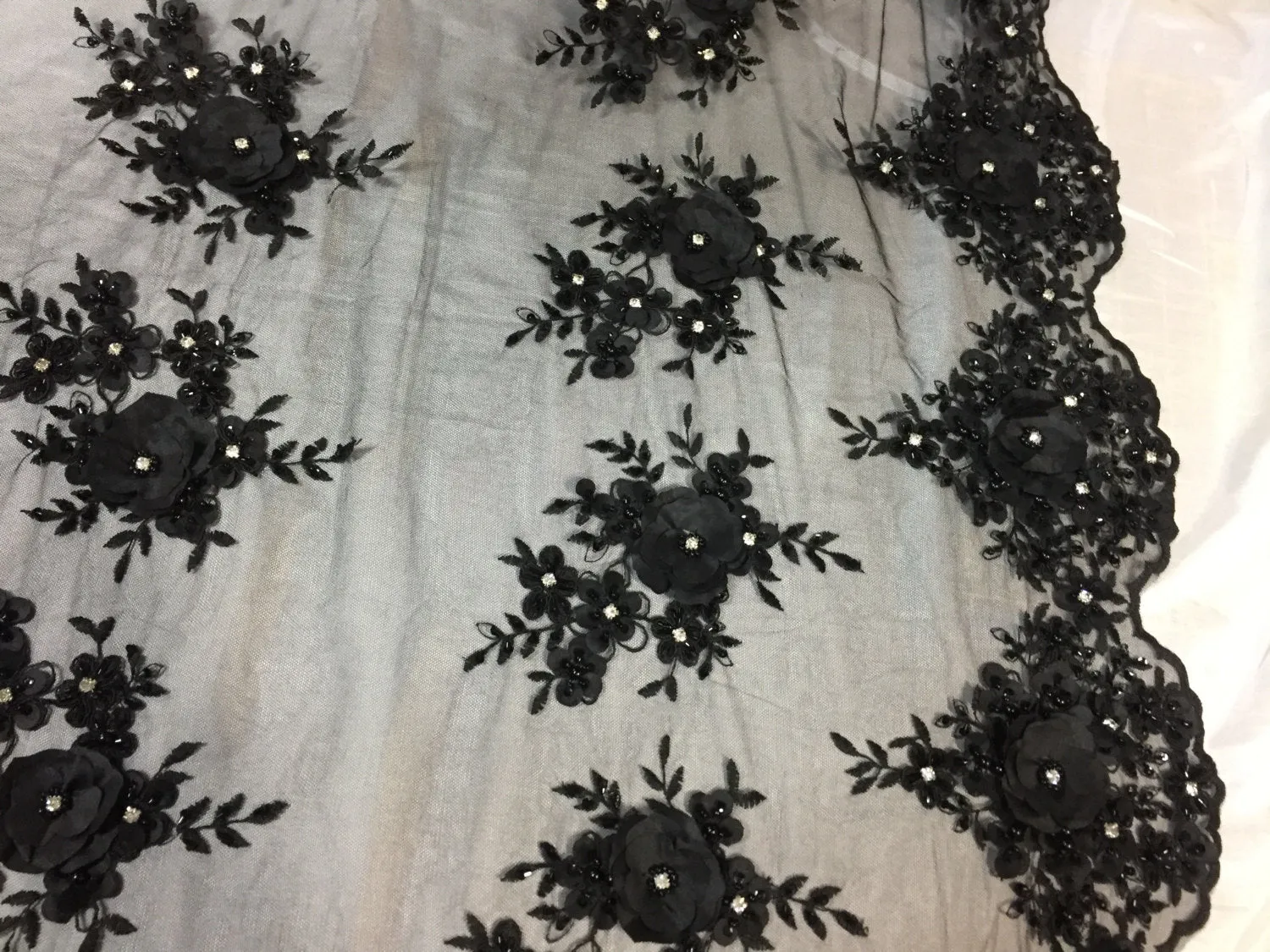 Lavish black 3D flowers embeoider and beaded on a mesh lace -yd