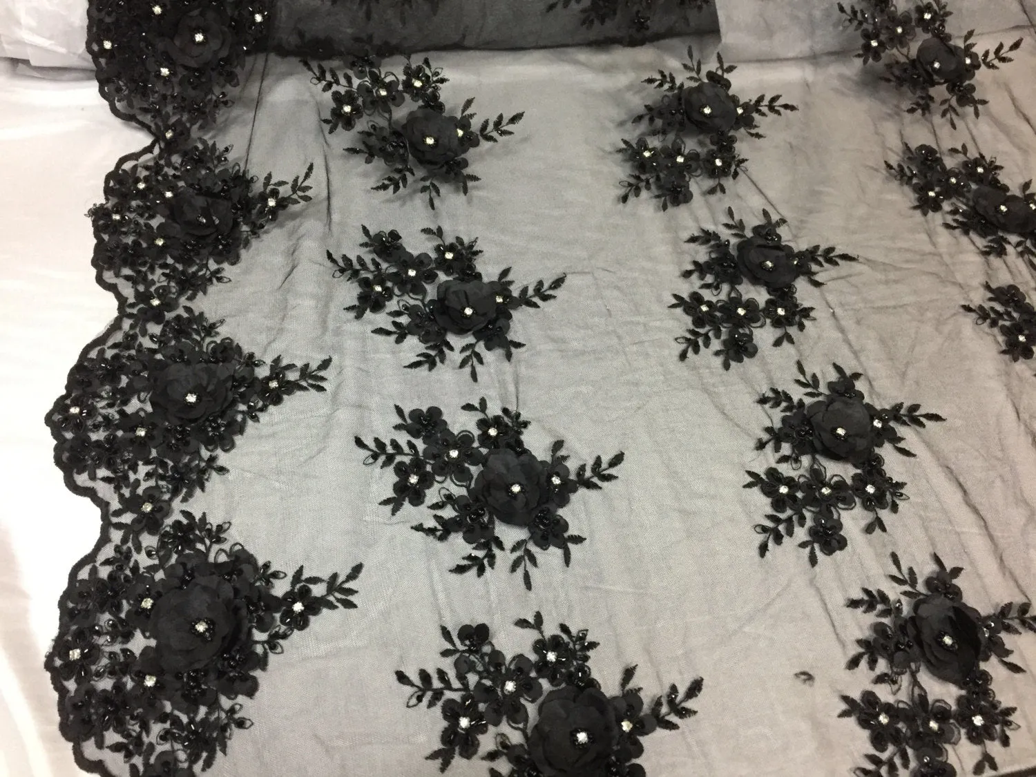 Lavish black 3D flowers embeoider and beaded on a mesh lace -yd