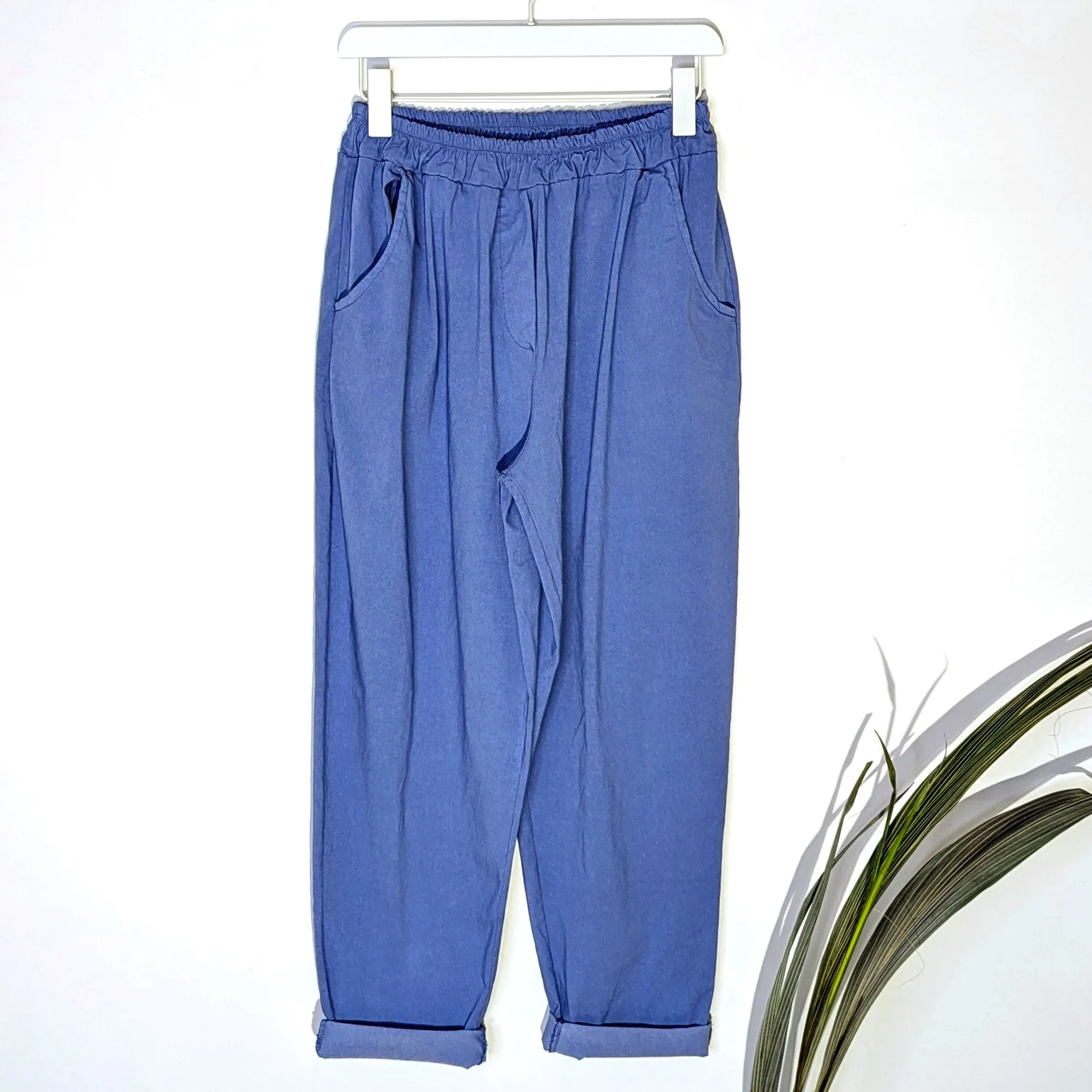 Relaxed super stretch vintage wash trousers with elasticated waist with front and back pockets